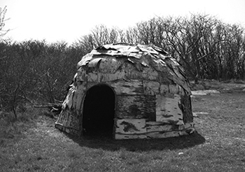 Historical photograph of a traditional Abenaki wigwam