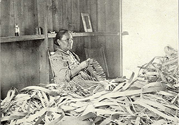 Historical photograph of an Abenaki basket maker